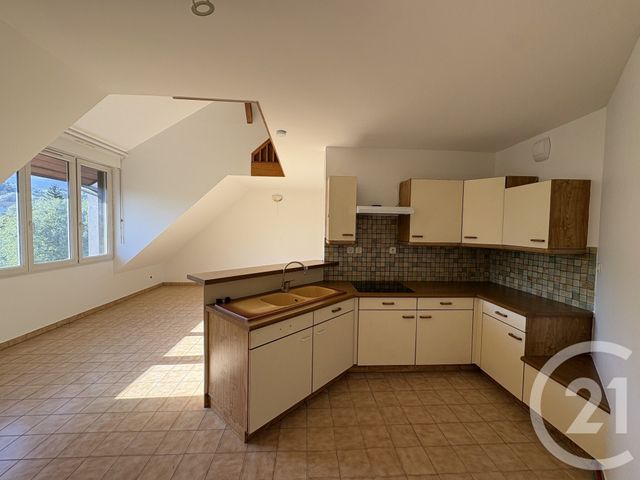 Appartement Duplex à louer - 2 pièces - 62.8 m2 - RUMILLY - 74 - RHONE-ALPES - Century 21 Confiance Services